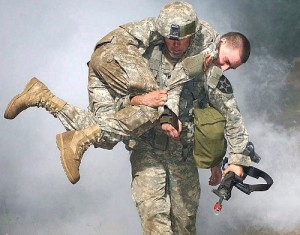 Picture of a soldier carrying another soldier