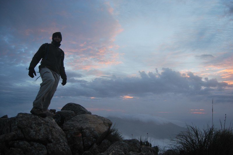 On top of the moutain, above the clouds, at sunrise