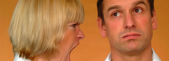 Photo of woman shouting at man