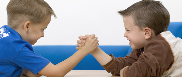 Like little boys arm wrestling...